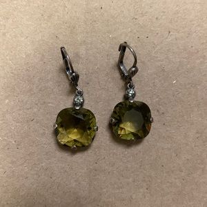 Olive green earrings dangle with lever back closure.